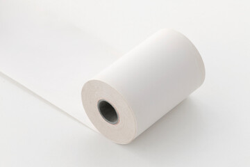 unwound paper roll, copy space, isolated on white background.