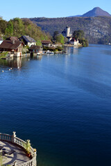 Landscape of Annecy lake and duignt village, in savoy, france - 595310521