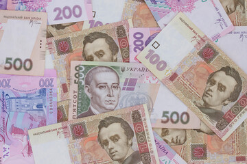 heap of one hundred, two hundred and five hundred hrivnya banknotes