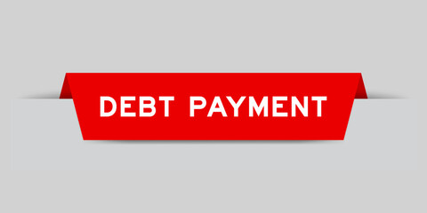 Red color inserted label with word debt payment on gray background