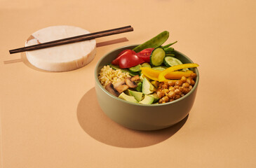 vegan bowl with mushrooms on beige background