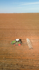 tractor preparing soil for soy planting in Mato Grosso