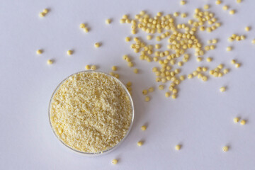 Gluten-free millet flour on white background. Space for text