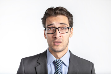 Close-up portrait of handsome smiling businessman in black suit isolated on white background