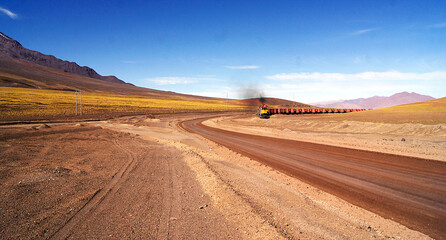 Fototapeta na wymiar Rail transport in the Altiplano, Los Andes, Chile