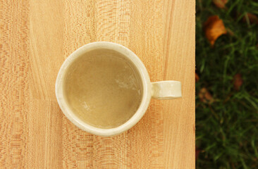 Fototapeta na wymiar mug wooden table