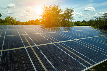 Aerial view of solar panels installed as shade roof over parking lot for parked cars for effective generation of clean electricity. Photovoltaic technology integrated in urban infrastructure © bilanol