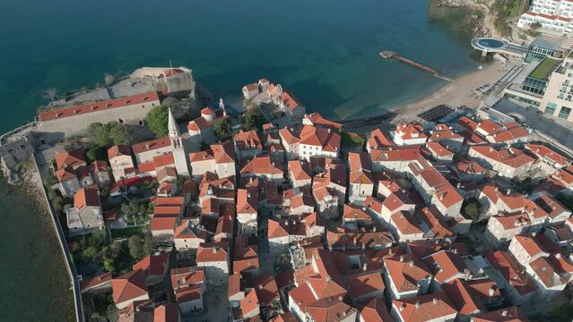 The old town of Budva shot from a drone. The best sights of Montenegro. Budva Old Town fantastic footage. Aerial view.
