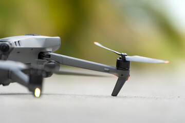 Closeup of motor and propeller of drone quadcopter for taking video and pictures. Preflight...