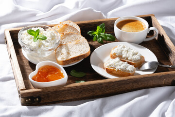 Breakfast in bed on a sunny morning