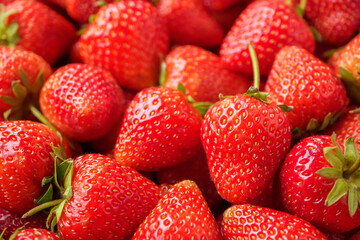 Fresh organic red strawberry fruit background