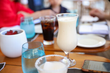 alcohol in the morning on vacation symbolizes relaxation, indulgence, and celebration. It represents a break from routine, a time to unwind and enjoy life. It can also suggest a desire to escape