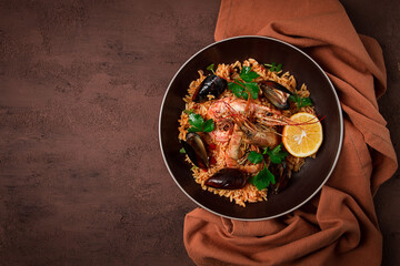 Seafood paella, shrimp and mussels risotto, rice, homemade, top view, no people,