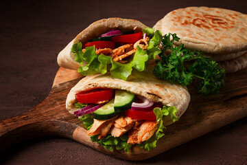 Shawarma in pita bread, chicken, with vegetables, homemade, no people,