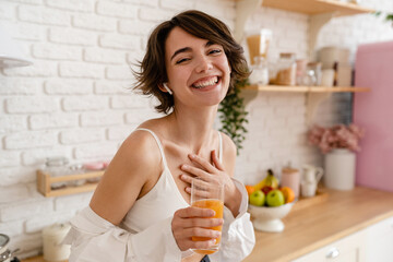 young pretty woman cooking at home, morning kitchen, healthy food