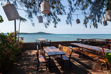 restaurant on the waterfront of rawai beach in thailand overlooking the sea and the island © Aleksandr Kondratov