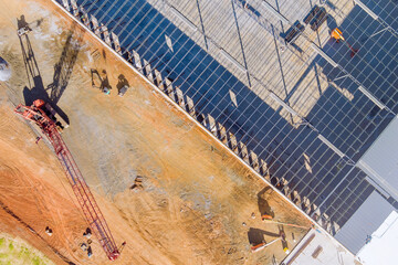 Construction work to metal construction frame steel for warehouse on construction site