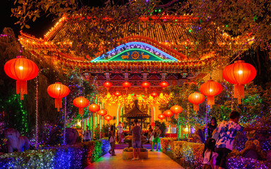 Kek Lok Si temple illuminated with thousand of lanterns to celebrate Chinese New Year 2023 in Penang - Malaysia - obrazy, fototapety, plakaty