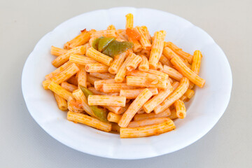 Macaroni Salad with red bell pepper, onion, celery, gherkins and mayonnaise dressing.Traditional Italian pasta with vegetables and creamy cottage cheese in a bowl. Fettuccini, alfredo makarna. 