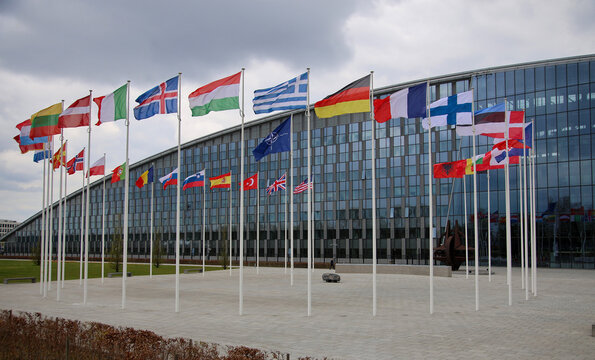 The national flags of countries member of the NATO fly outside the organisation headquarters in Brussels, Belgium on April 20 2023.