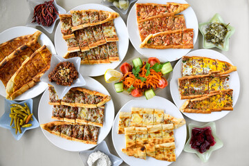 Kiymali pide. Turkish pide with minced meat. Turkish pizza mince pita Pide on white background. Etli ekmek. Kusbasi kasarli pide.