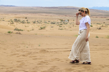 Woman walking at Desert