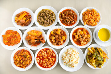 Table scene of assorted take out or delivery foods. Traditional Turkish cuisine. Various Turkish meal and appetizers. Top down view on a table.