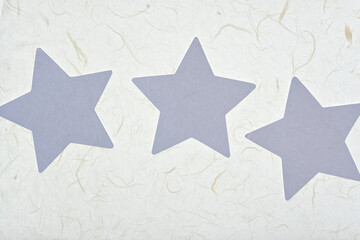 grunge background with three paper stars