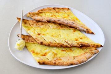 Kiymali pide. Turkish pide with minced meat. Turkish pizza mince pita Pide on white background. Etli ekmek. Kusbasi kasarli pide.