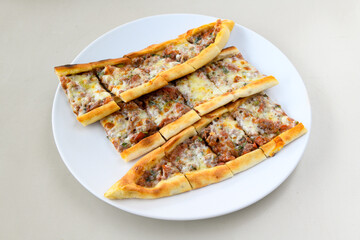 Kiymali pide. Turkish pide with minced meat. Turkish pizza mince pita Pide on white background....