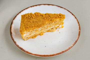 San sebastian ( Bask ) cheesecake slice isolated close up. Limon, lotus, fistikli, Frambuazli cheesecake