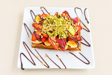 Homemade Belgium Waffles with Blueberries and Almonds. Classic , double bubble waffle. Kulah meyveli waffle.