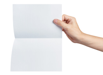 Hand holding a sheet of white paper, folded in half, cut out