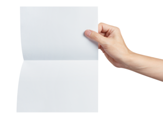 Hand holding a sheet of white paper, folded in half, cut out