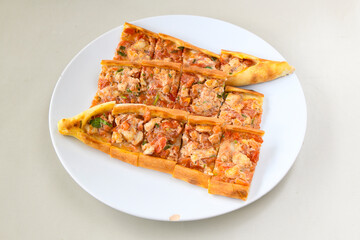 Kiymali pide. Turkish pide with minced meat. Turkish pizza mince pita Pide on white background. Etli ekmek. Kusbasi kasarli pide.