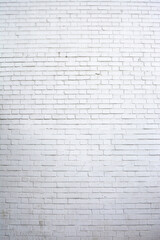English brick wall painted in white in portrait format