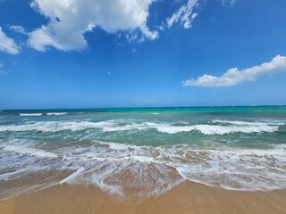 Fototapeta na wymiar Atlantic beach and blue sky