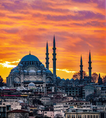 Fototapeta na wymiar Sunset in Istanbul, Turkey with Suleymaniye Mosque (Ottoman imperial mosque). View from Galata Bridge in Istanbul. TURKEY