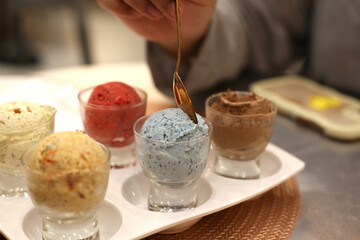 close up colorful icecream shot scoop on salver tray