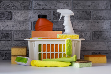 A bucket with cleaning supplies