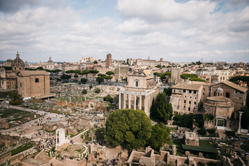 Fototapeta na wymiar View of the Roman Forum and Rome, Italy on a Cloudy Day