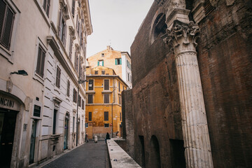 Walking through the city streets of ancient Rome in Italy