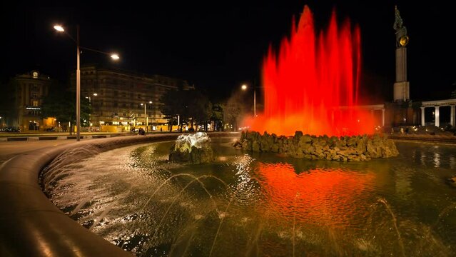 Night view of the colorful fountain at Schwarzenbergplatzin Vienna, Austria.
