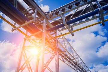 Modern steam pipeline for industrial on blue skies background.