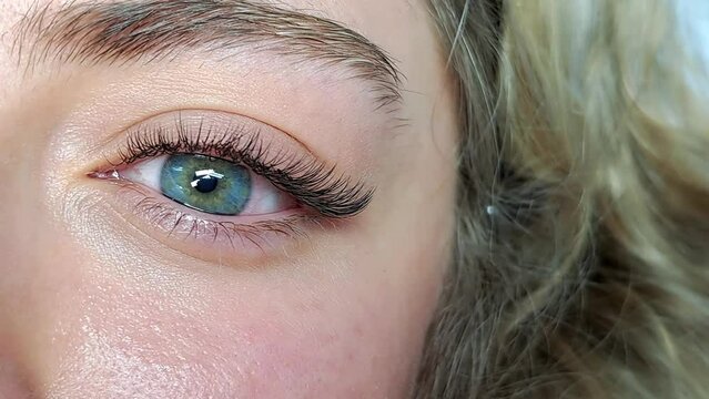 close up of eye with eyelash extensions ,beauty salon treatment,2d volume,3d volume,russian volume,mega volume