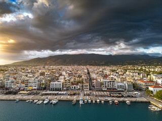 Fototapeta premium Aerial iconic sunset view over the port of Kalamata seaside city, Greece