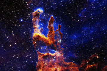 The pillars of creation, the cosmic nebula. Elements of this image furnished NASA.