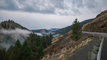 Fototapeta na wymiar Mountain gravel road and views in Eastern Oregon
