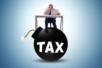 Tax concept with exploding bomb