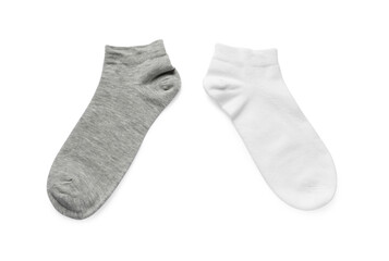 Different socks isolated on white, top view